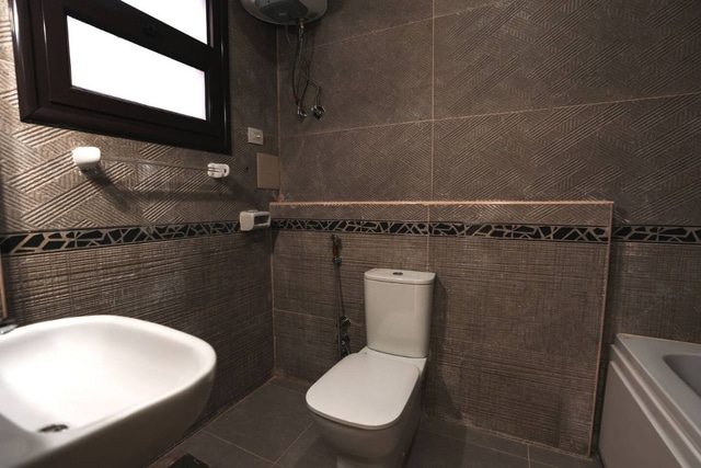 Bright 3BR Home Near Arkan Plaza